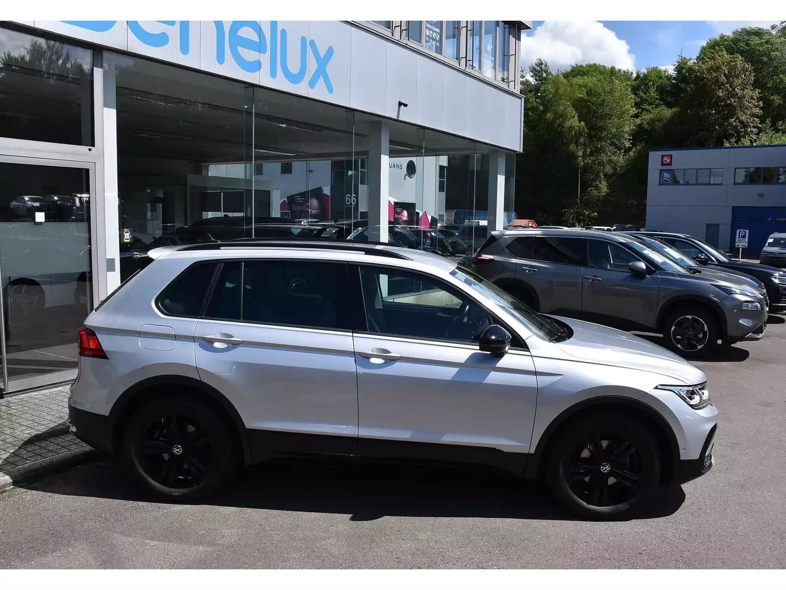 Volkswagen Tiguan 1.5 TSI URBAN SPORT DSG ACC TRAVEL SIDE HUD HARMAN ATT RMQ 1° MAIN - Photo 1