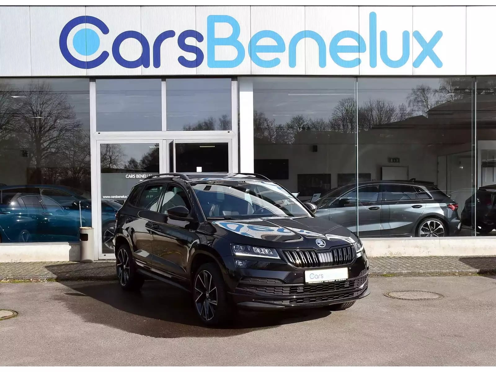 Skoda Karoq 1.5 TSI Sportline DSG PANO ACC TRAVEL SIDE CANTON ATT RMQ 1° MAIN - Photo 1